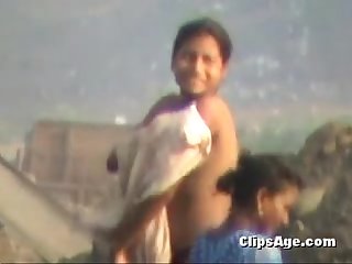 girl bath in open desi farm